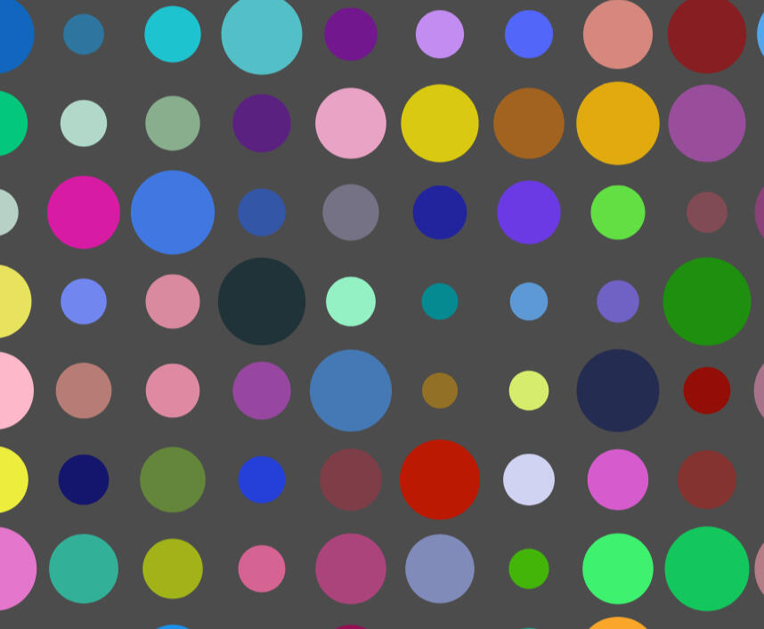 many multicolored dots on a dark gray background